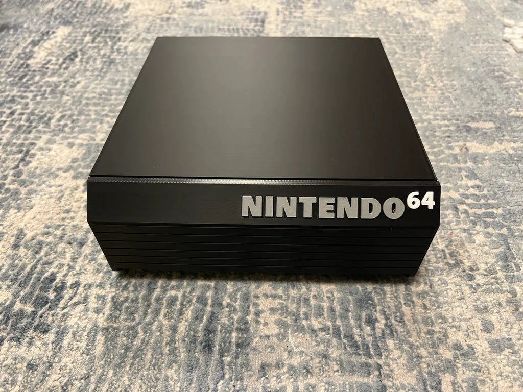 N64 cartridge drawer open with games