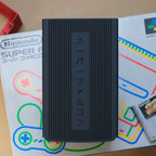 SNES cartridge organizer underside with anti-slip pad mounts