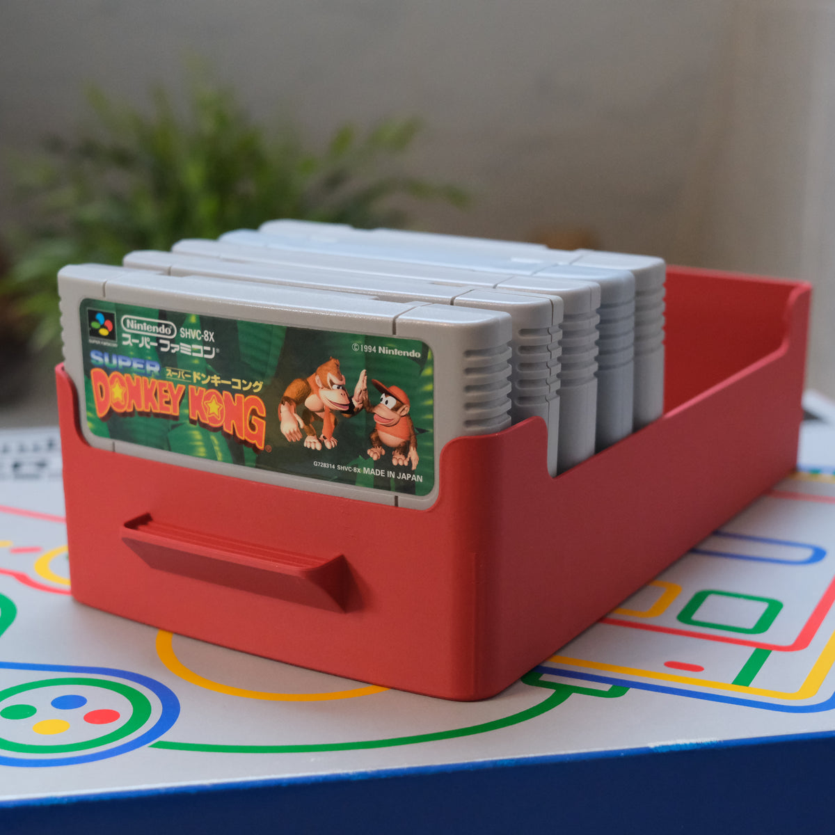 Super Nintendo cartridge storage box detail