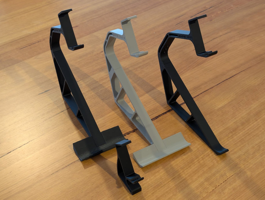 Xbox 360 display stand parts laid out side by side