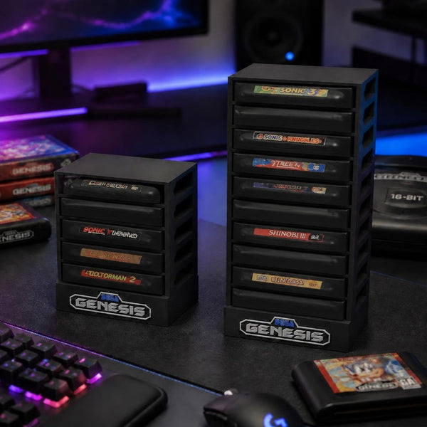 Black 3D-printed Sega Genesis cartridge stands, 5-slot and 10-slot, on a gamer desk (concept image)